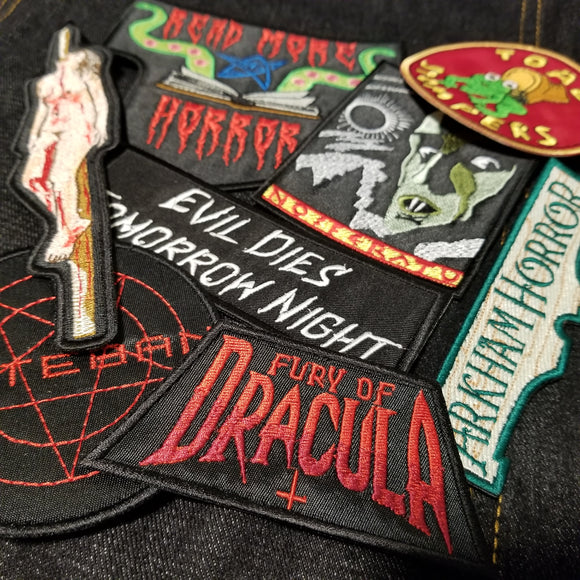 Horror-inspired embroidered patches from Thread By Dawn.