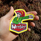 Parody embroidered patch featuring an anime style version of the Weebler Elf as the Weebler Elf.