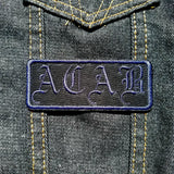 Navy on black ACAB patch in old english lettering.