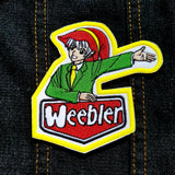 Parody embroidered patch featuring an anime style version of the Weebler Elf as the Weebler Elf.