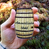 Cask of Amontillado embroidered patch, based on the short story by Edgar Allan Poe, shown in the palm of a hand for size reference.