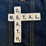 Embroidered patch of the words death metal in Scrabble letters.