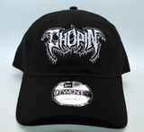 Front view of a black baseball hat with a heavy metal style logo for the classical music composer Chopin embroidered on the front in white thread.