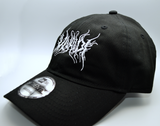 Left side view of a black baseball cap with a heavy metal style logo for the classical music composer Vivaldi embroidered on the front in white thread.