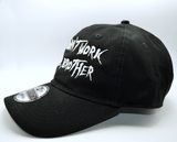 A black baseball cap with the phrase, that don't work for me, brother, embroidered in white thread on the front in large lettering.