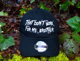 A black baseball cap with the phrase, that don't work for me, brother, embroidered in white thread on the front in large lettering.
