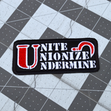 Rectangular black embroidered patch with the words unite, unionize, undermine written in a stencil font, featuring a red sickle.