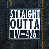 Square black and white embroidered patch that says straight outta LV-426. Shown on a denim jacket.