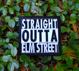 Square black and white embroidered patch that says straight outta elm street.