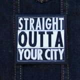 A square shaped white and black embroidered patch in the Straight Outta Compton format that can be customized with personal text.