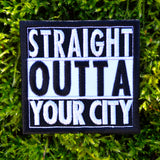 A square shaped white and black embroidered patch in the Straight Outta Compton format that can be customized with personal text.