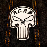Black and white ACAB Punisher symbol patch.