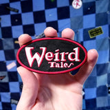 Embroidered patch of the logo for the classic horror and science fiction journal Weird Tales.