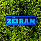 Rectangular two-tone blue on black embroidered logo patch for the cult classic Japanese sci-fi action movie Zeiram.