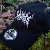 Black baseball cap with a heavy metal style logo for the classical music composer Vivaldi embroidered on the front in white thread.