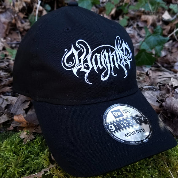 Black baseball cap with a heavy metal style logo for the classical music composer Wagner embroidered on the front in white thread.