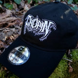 Black baseball cap with a heavy metal style logo for the classical music composer Chopin embroidered on the front in white thread.