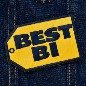 Yellow and black embroidered parody patch resembling the best buy logo that says best bi instead.