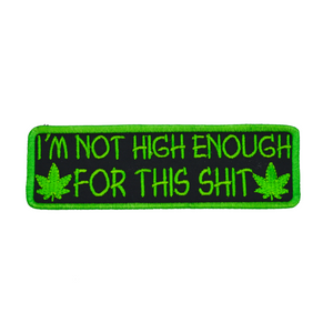 Rectangular green on black embroidered patch that says I'm not high enough for this shit, along with two pot leaves.