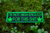 Rectangular green on black embroidered patch that says I'm not high enough for this shit, along with two pot leaves.