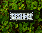 Rectangular white on black embroidered patch with the name of the classical music composer Brahms stylized to resemble a heavy metal band logo.