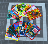 A collection of printed patches with embroidered borders featuring theatrical poster art from classic horror and sci-fi movies from the 1930s to the 1960s.
