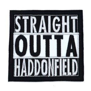 Square black and white embroidered patch that says straight outta haddonfield, inspired by the Halloween movie series.