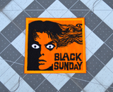 Rectangular orange and black embroidered patch for the classic horror movie black sunday.