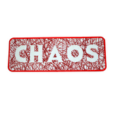 Rectangular embroidered patch with the word chaos cut out of random lines of red thread on white fabric.