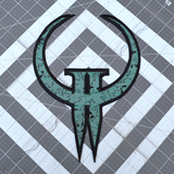 Embroidered patch made from the logo of the classic first person shooter video game Quake 2.
