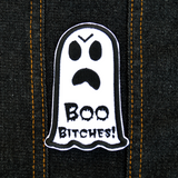 Black and white embroidered patch of an angry ghost with text that says 'Boo Bitches!'.