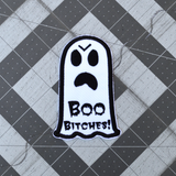 Black and white embroidered patch of an angry ghost with text that says 'Boo Bitches!'.