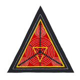 A triangular embroidered patch with a black border, textured red background and geometric designs in silver and gold metallic thread.