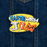 An embroidered patch made from the logo of the classic platformer video game Earthworm Jim.
