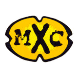 A black and yellow oval-shaped logo patch for the comedy tv show MXC.