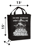 Sizing dimensions of a black canvas tote bag with a white screen printed graphic of a zombie in a pile of boardgames and a caption saying one more boardgame won't kill me.