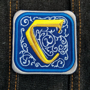 Embroidered patch for the classic board game Carcassonne.