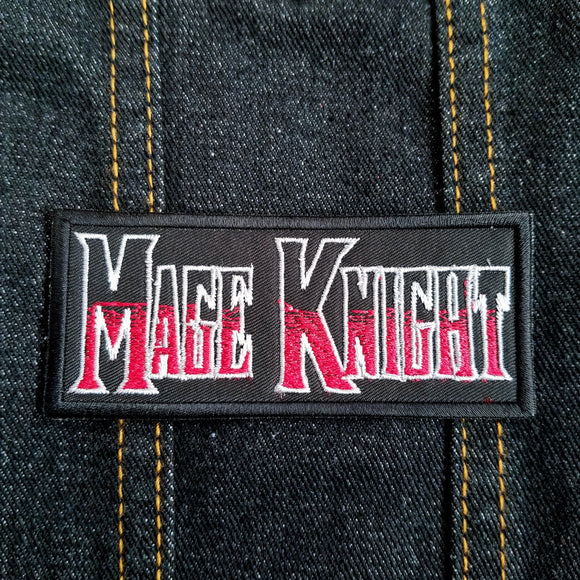 Red and silver on black embroidered logo patch for the adventure boardgame Mage Knight.