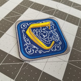 Embroidered patch for the classic board game Carcassonne.